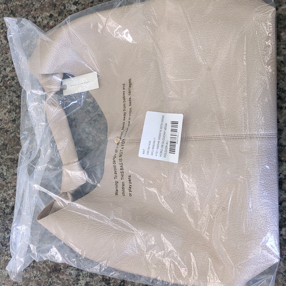 Anthropologie Gold Hobo Bag
